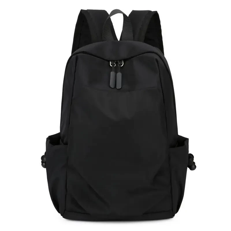 A sleek black backpack with two side pockets, featuring padded straps and a smooth, minimalist design. Ideal for daily use.
