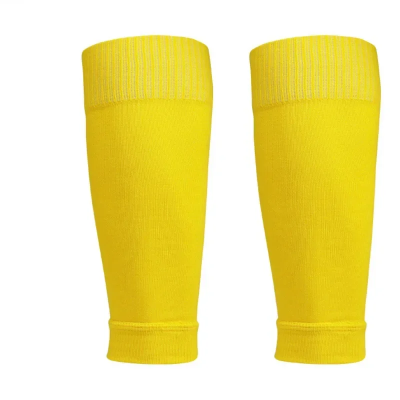 Bright yellow knee-length socks featuring a ribbed top and bottom hem, ideal for sports or casual wear.