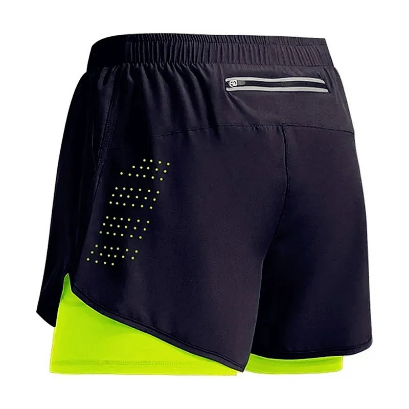 Black and neon green athletic shorts featuring a zippered pocket and dot pattern detail on the side. Ideal for sports and workouts.