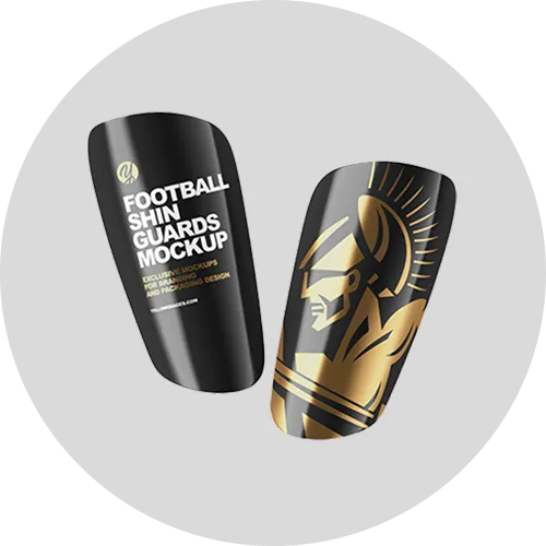 Two football shin guards mockup showcasing a sleek black design with gold accents and a prominent warrior logo.