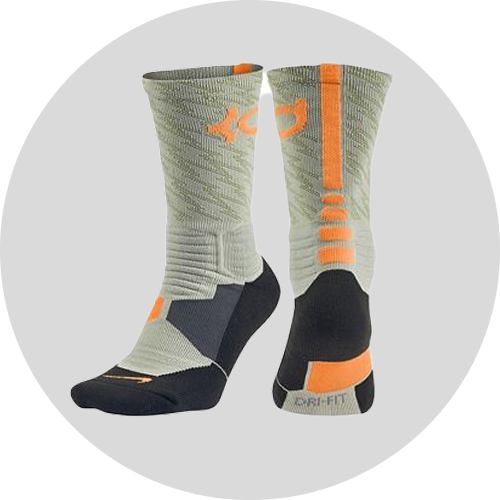 Light gray athletic socks with orange accents and black heel socks, featuring a textured design for enhanced grip and performance.